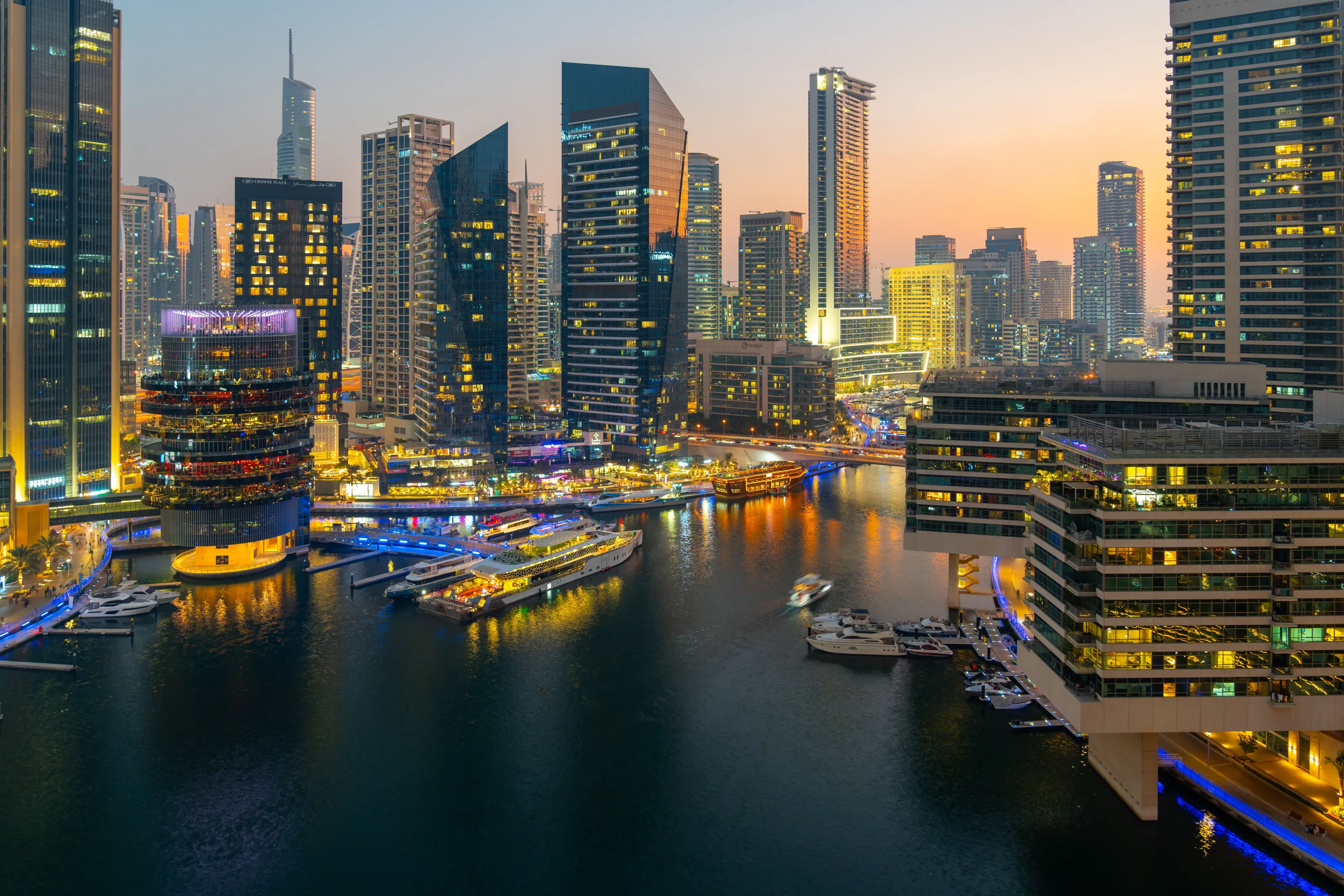 Dubai Marina waterfront and illuminated towers at twilight