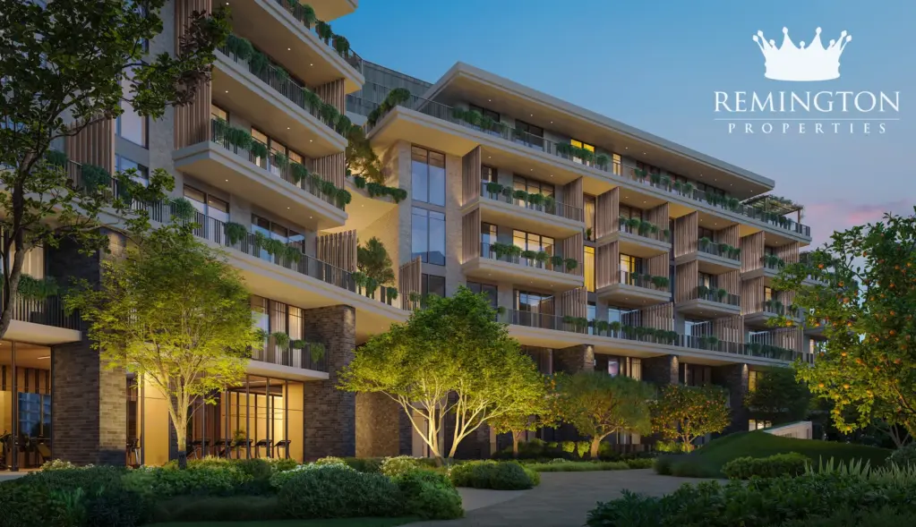 Evening view of the illuminated Arancia Yards 2 residential facade