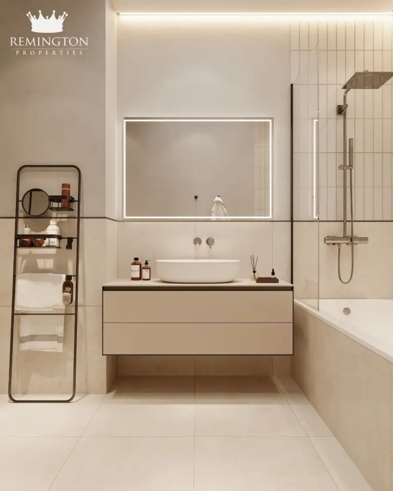 Apartment bathroom with fitted vanity and bathtub
