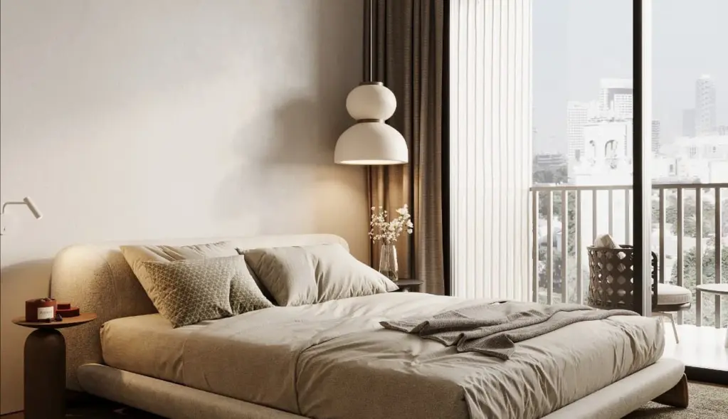 Bedroom opening to a private balcony