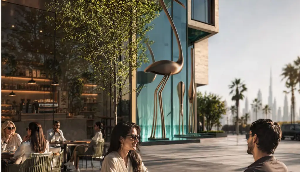 Outdoor cafe seating beside the Binghatti Starfall retail promenade in Al Jaddaf