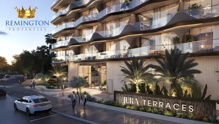Jura Terraces entrance and curved balcony facade at dusk
