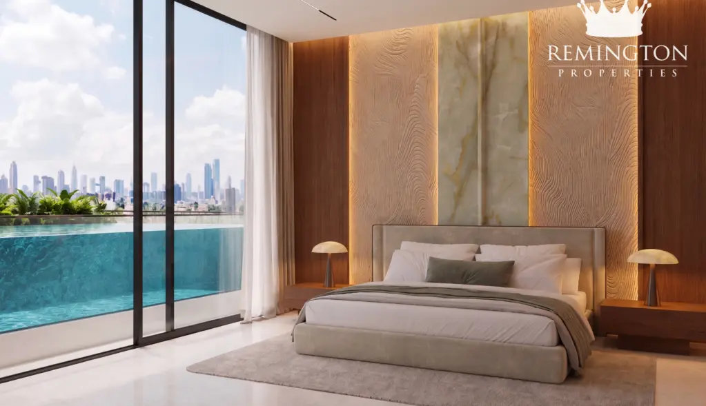 Primary bedroom opening to a private pool view