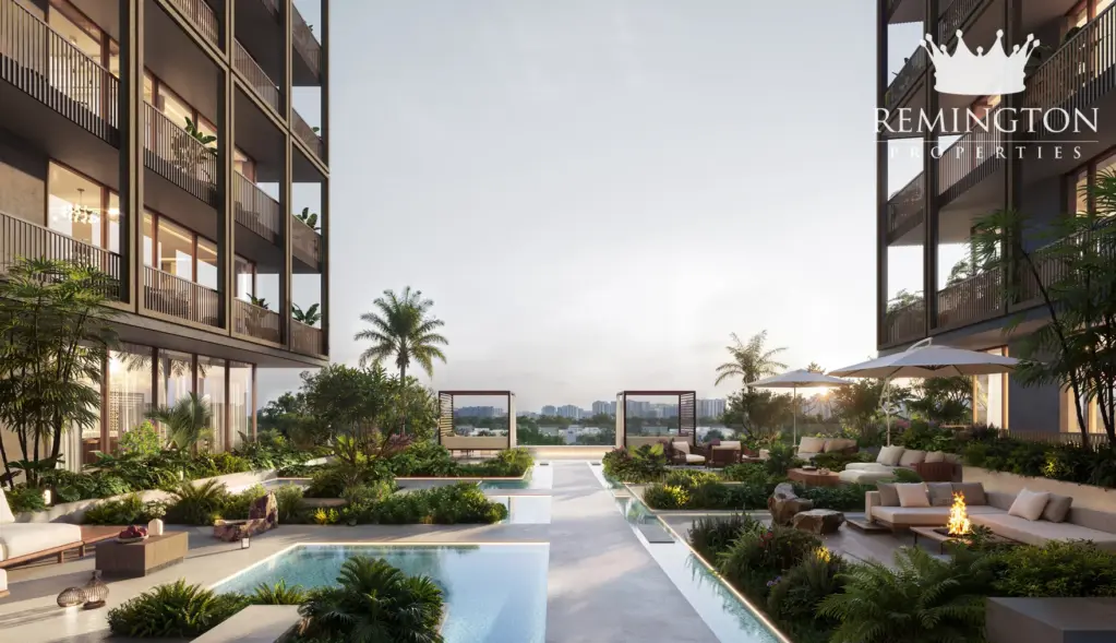Landscaped courtyard with water features beside the building