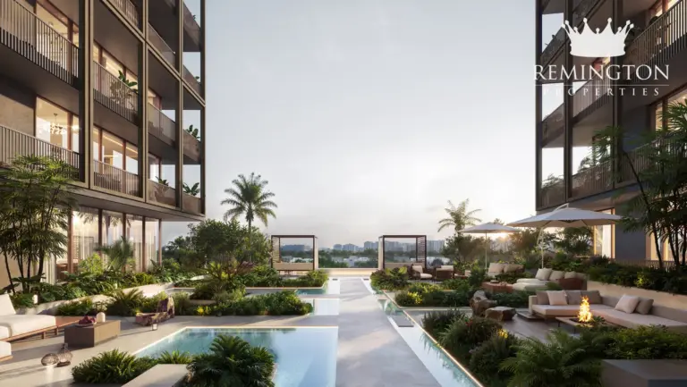 Landscaped courtyard with water features beside the building