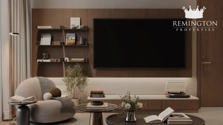 Furnished one-bedroom living room with media wall and reading shelves