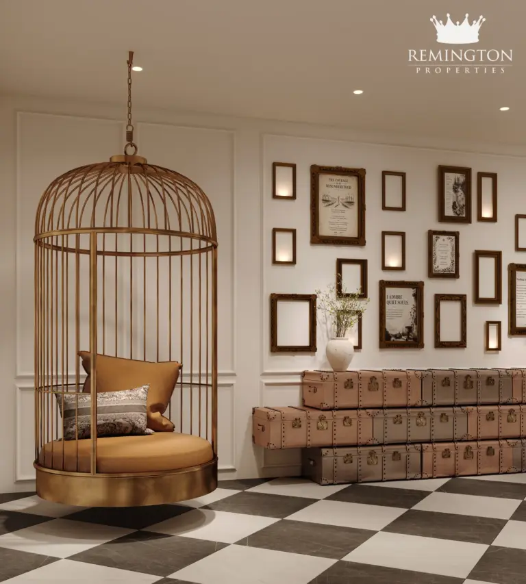 Quiet reading corner with an armchair and wall of framed art
