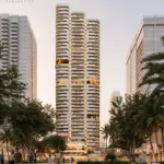Nine Collective rises above a landscaped plaza with shops and cafés at its base.