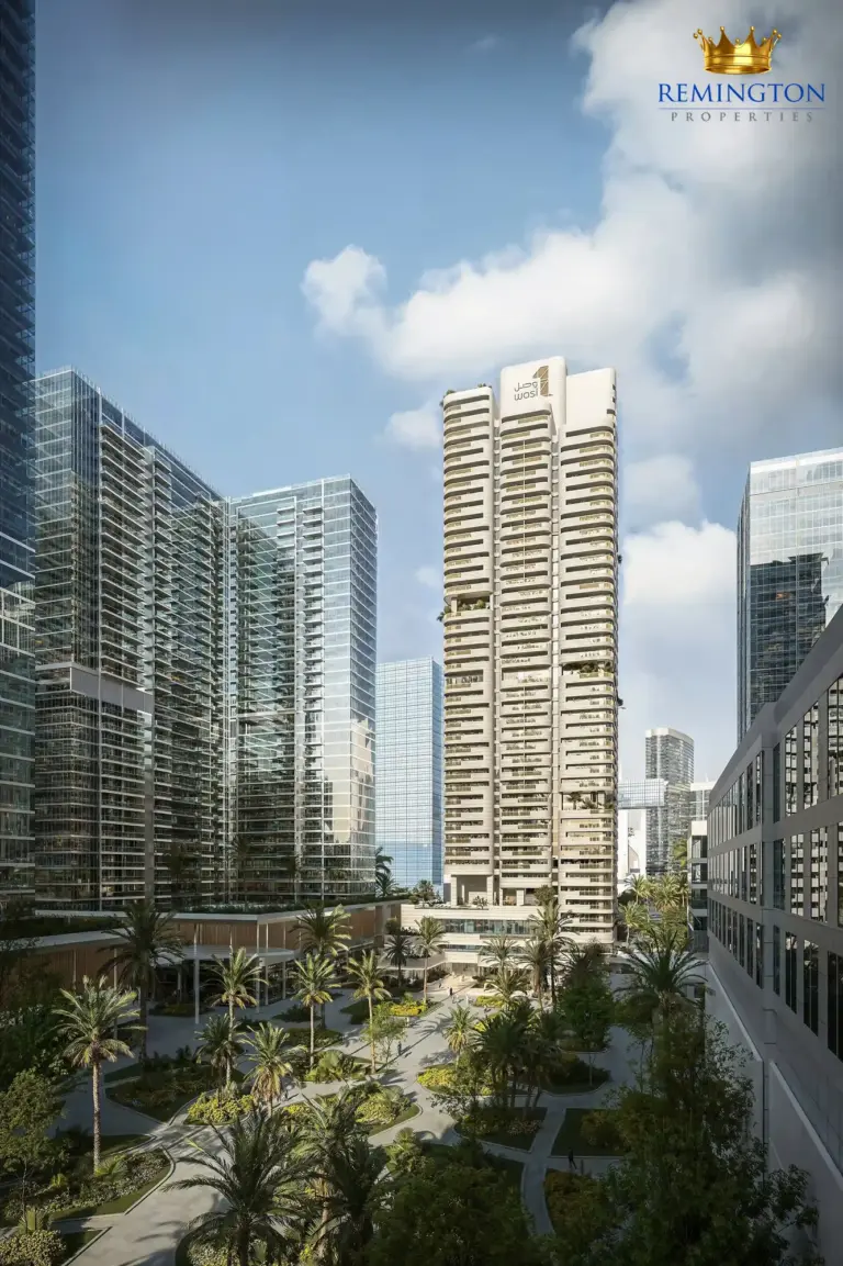 A residential tower stands over landscaped pathways and planted community spaces.