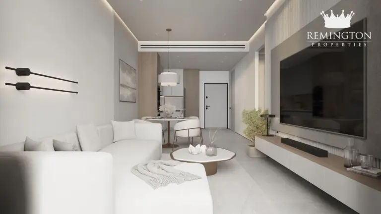 Open-plan one-bedroom living room and dining area at Sakura Gardens