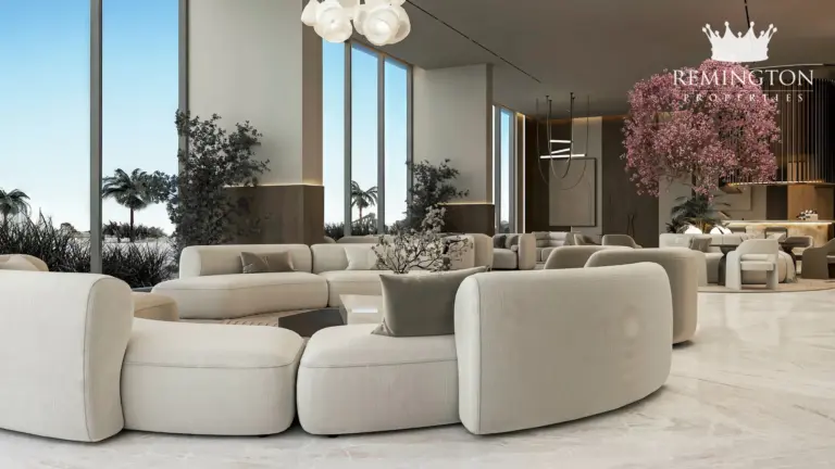 Living room with a curved sofa and views of flowering trees