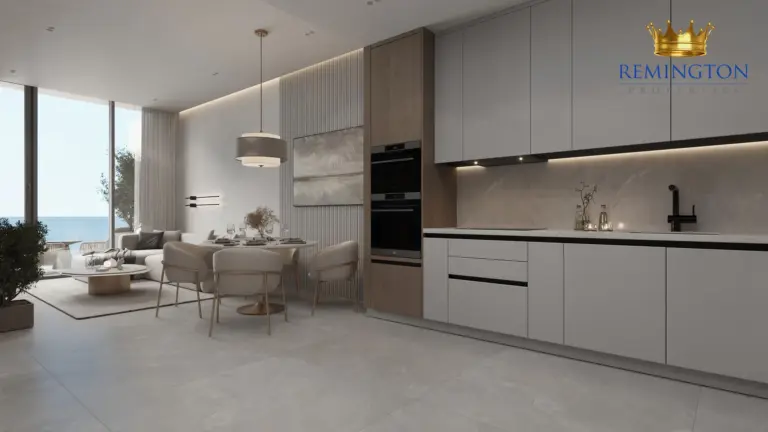 Living and dining area beside the kitchen in a one-bedroom home