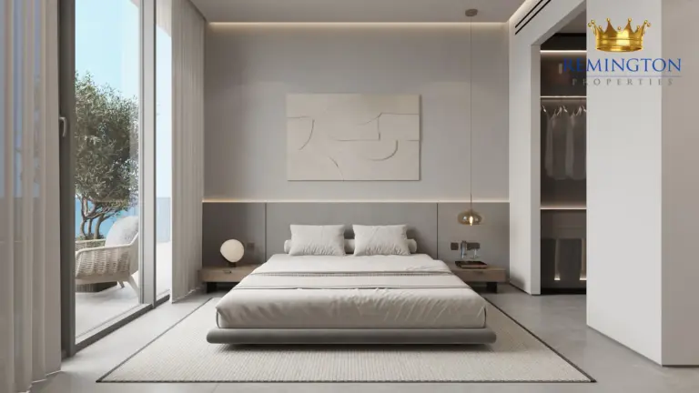 Principal bedroom with a king bed and soft neutral finishes
