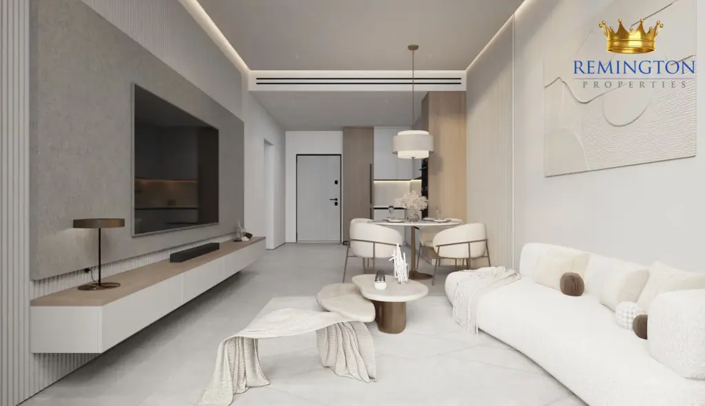 Open-plan living room and dining space in a two-bedroom residence