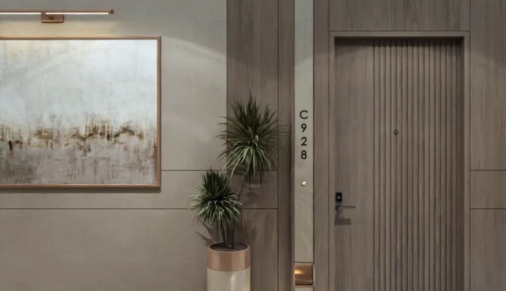 Residential corridor with timber doors and a console niche