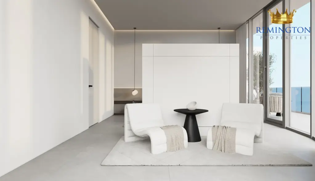 Bedroom with balcony access and a built-in wardrobe
