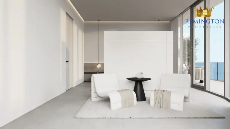 Bedroom with balcony access and a built-in wardrobe
