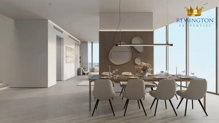 Dining area and kitchen island in a three-bedroom residence