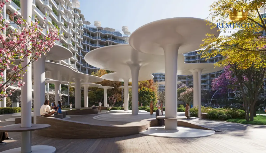 Sculptural canopy above a landscaped pedestrian entrance