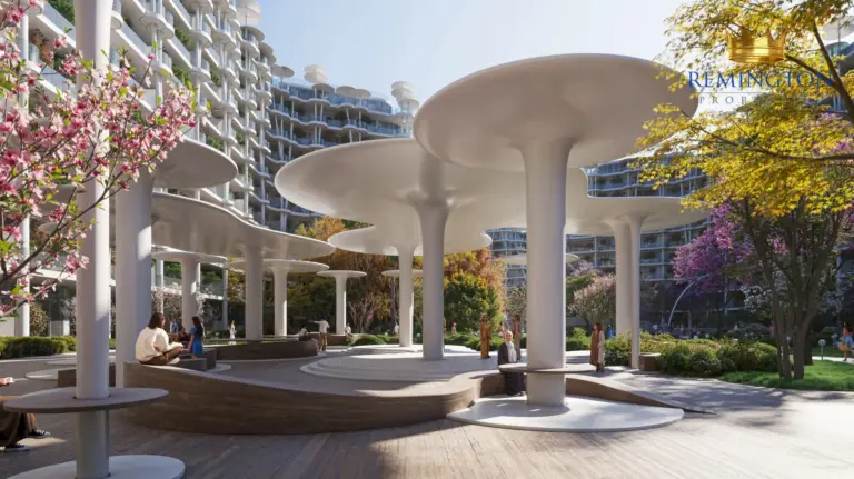 Sculptural canopy above a landscaped pedestrian entrance