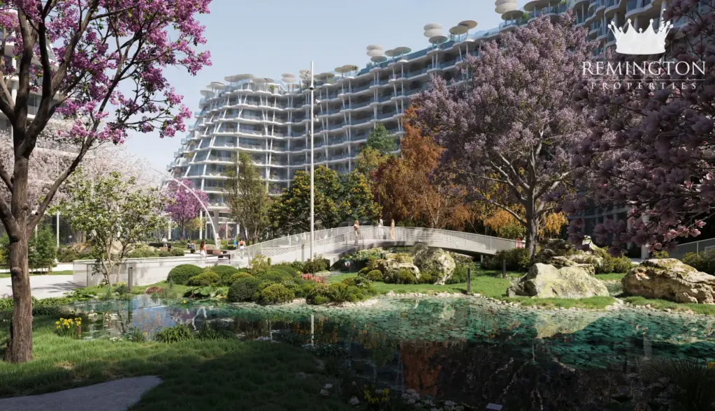 Curving garden path beneath flowering trees beside the residences