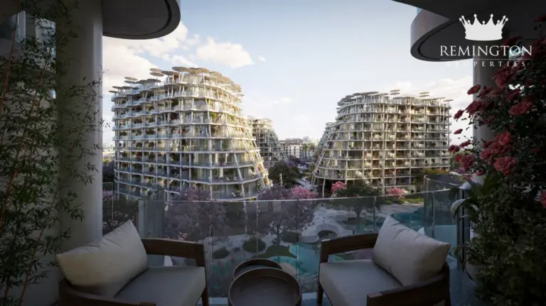 Outdoor lounge seating beneath the residences at twilight