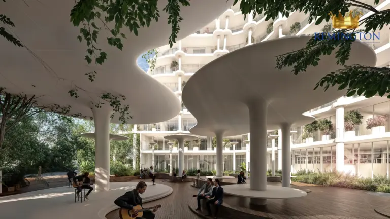 Shaded pedestrian promenade beneath the curved residential facade