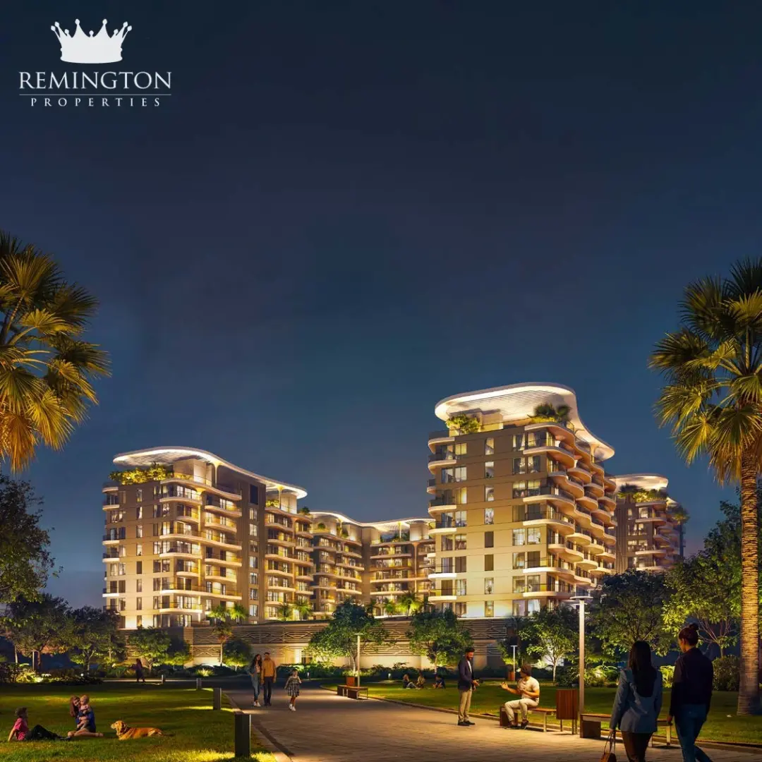 Sorrento Lagoon Views by DAMAC: Illuminated residences and landscaped walk at dusk
