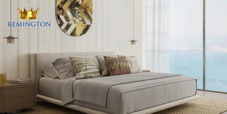 Bedroom interior with an upholstered bed, textured curtains and a waterfront window