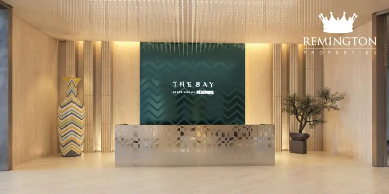 The Bay reception desk with patterned wall panels and warm interior finishes