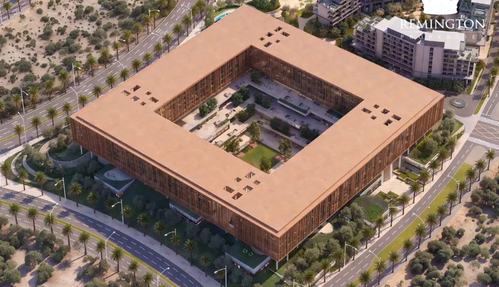 Aerial view of the four-block commercial composition around a landscaped central courtyard