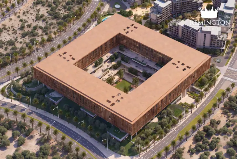 Aerial view of the four-block commercial composition around a landscaped central courtyard