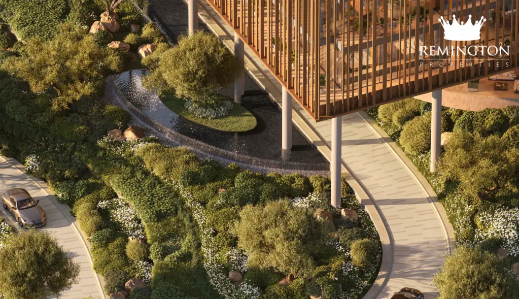 Oblique view of the commercial façade above planted terraces and winding pedestrian paths